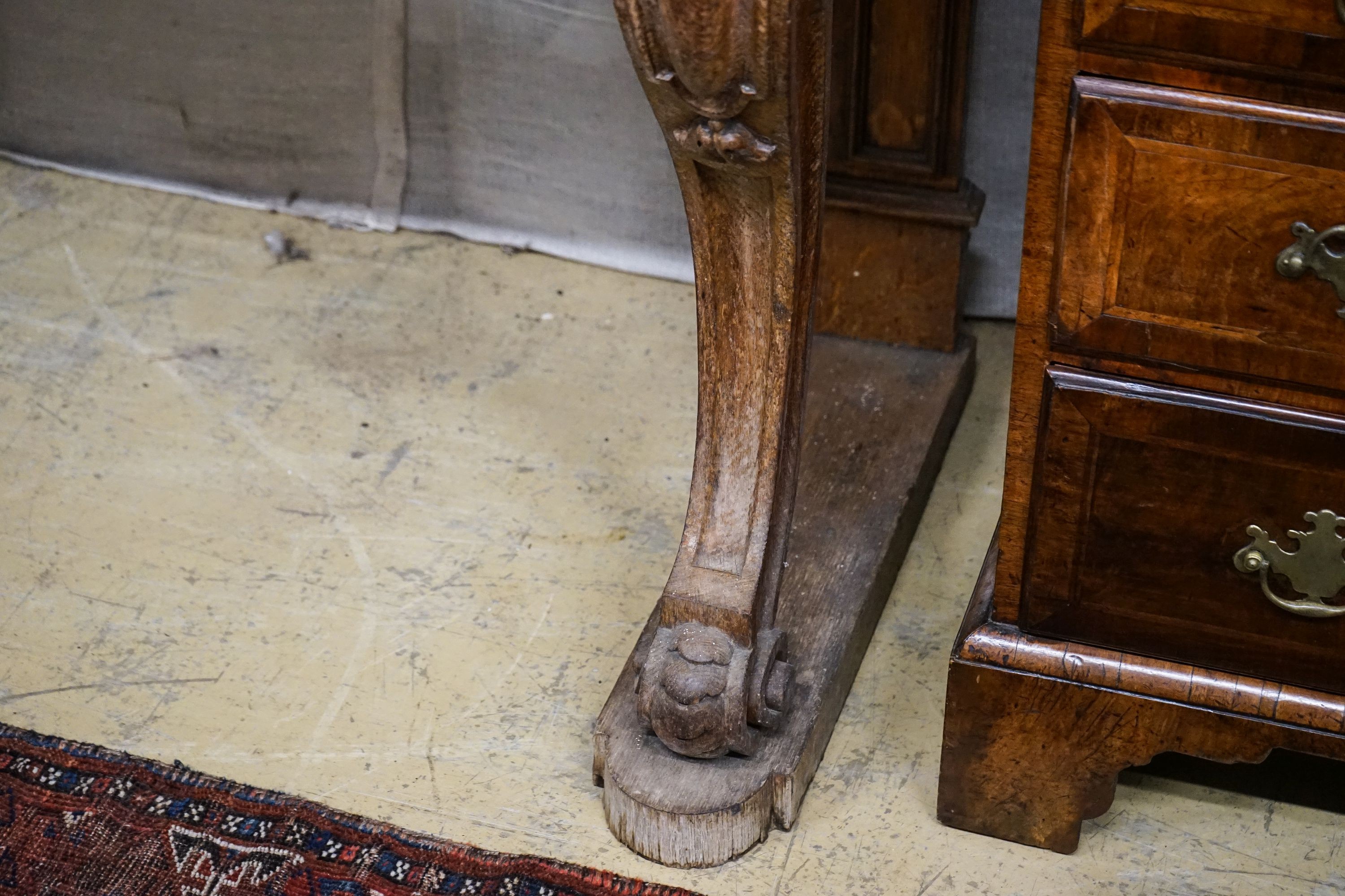 A mid Victorian oak marble topped two drawer console table, width 138cm, depth 54cm, height 120cm